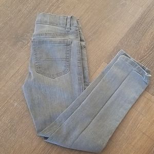 Kids skinny grey jeans.